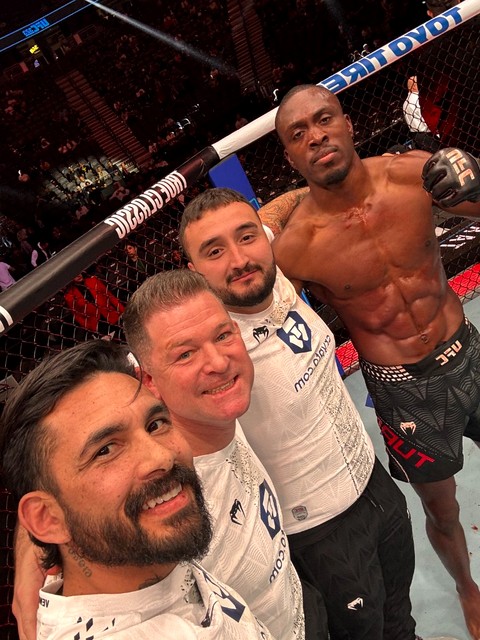 Corner team in the UFC octagon