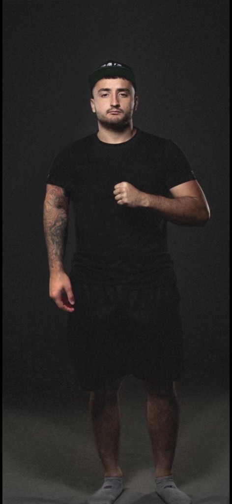 Combat sports coach in athletic wear